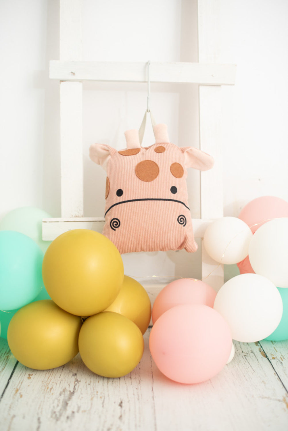 Manta infantil de viaje jirafa rosa