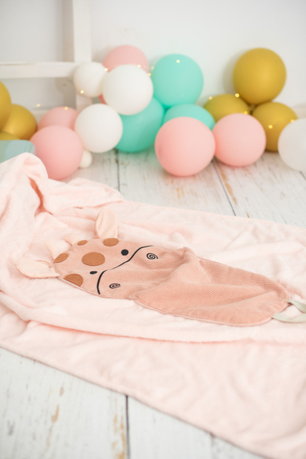 Manta infantil de viaje jirafa rosa