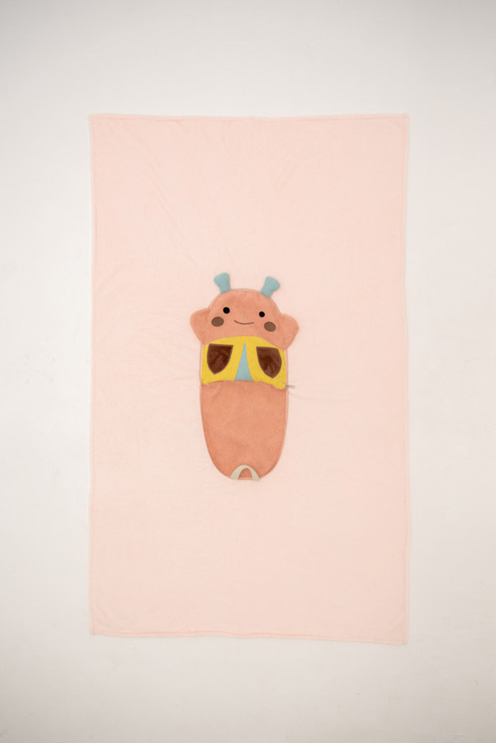 Manta infantil de viaje mariquita rosa