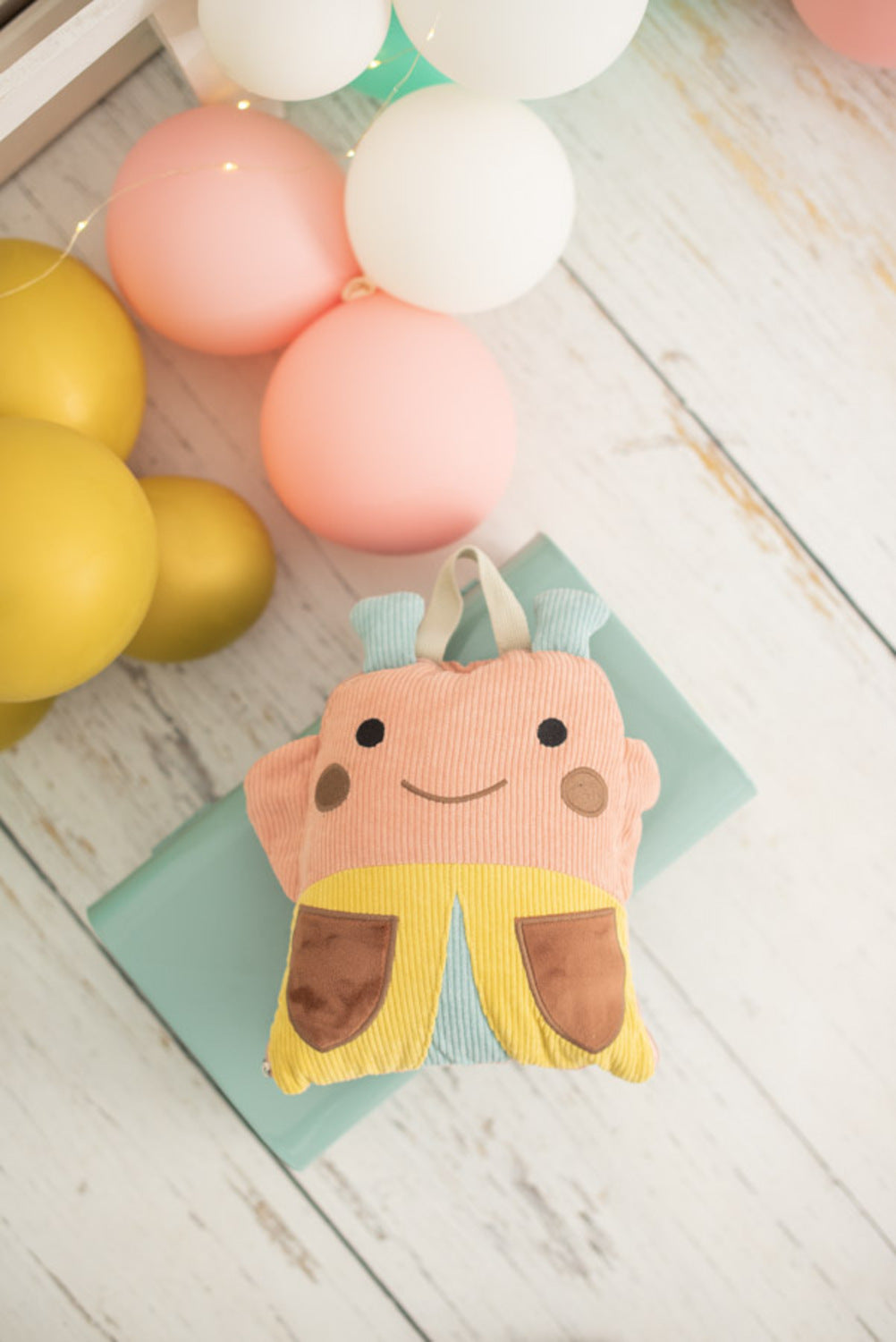 Manta infantil de viaje mariquita rosa