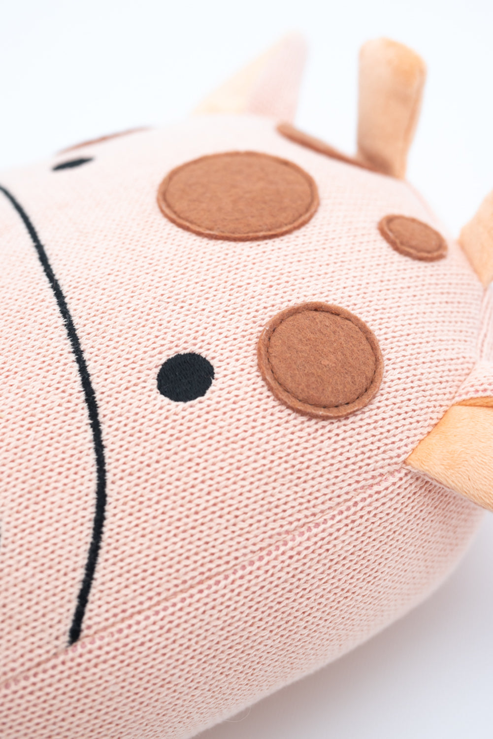 Cojin infantil jirafa rosa