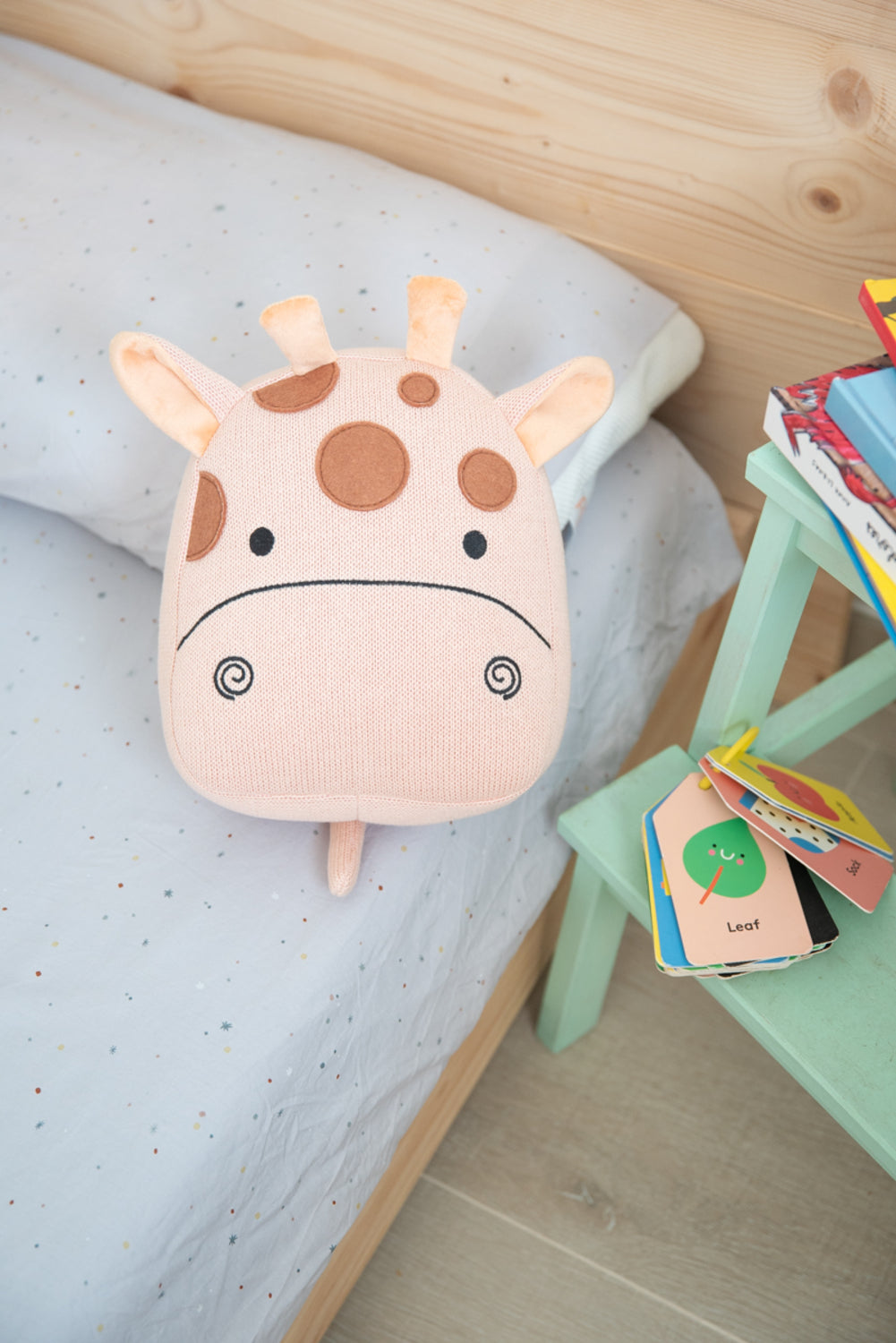 Cojin infantil jirafa rosa