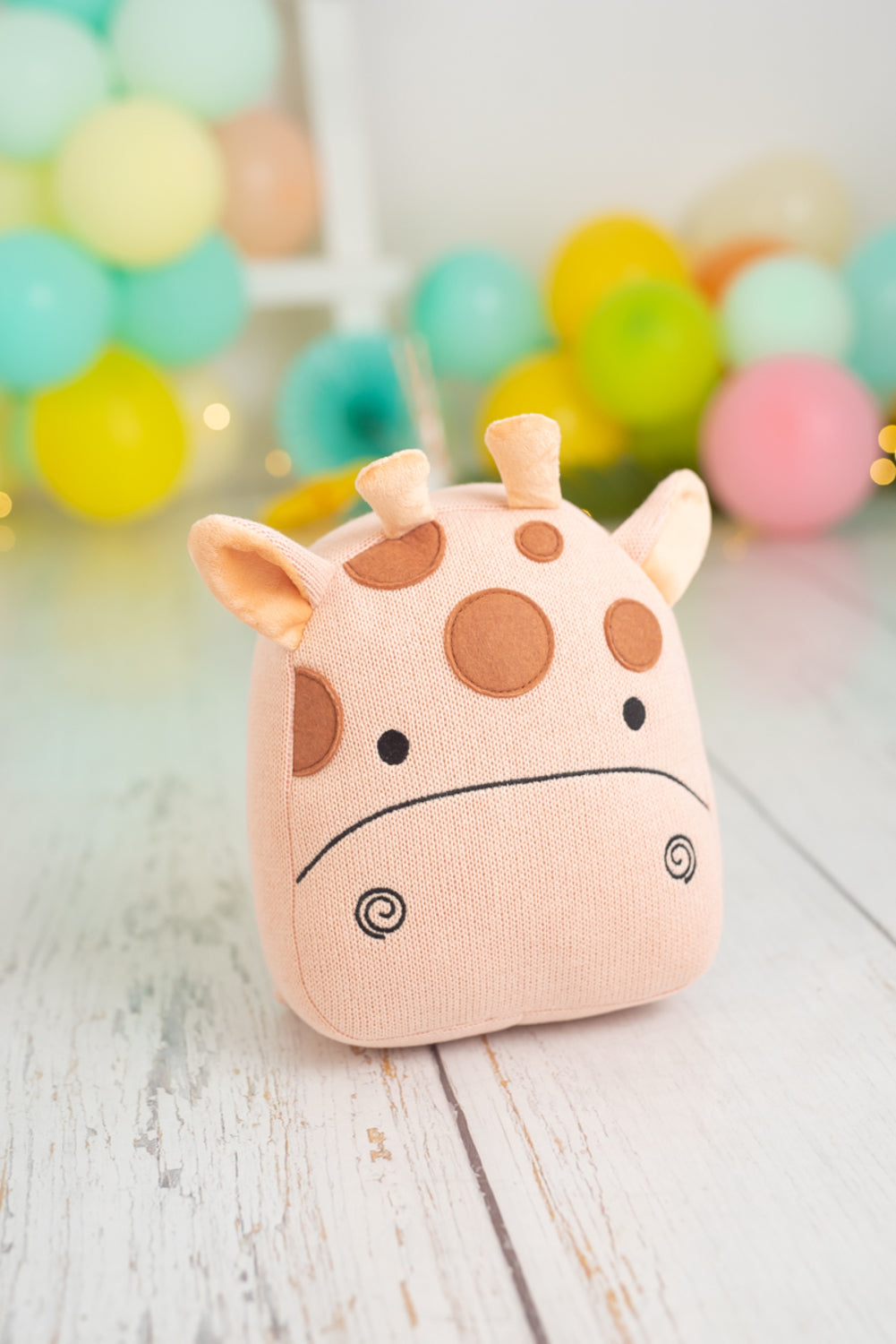 Cojin infantil jirafa rosa