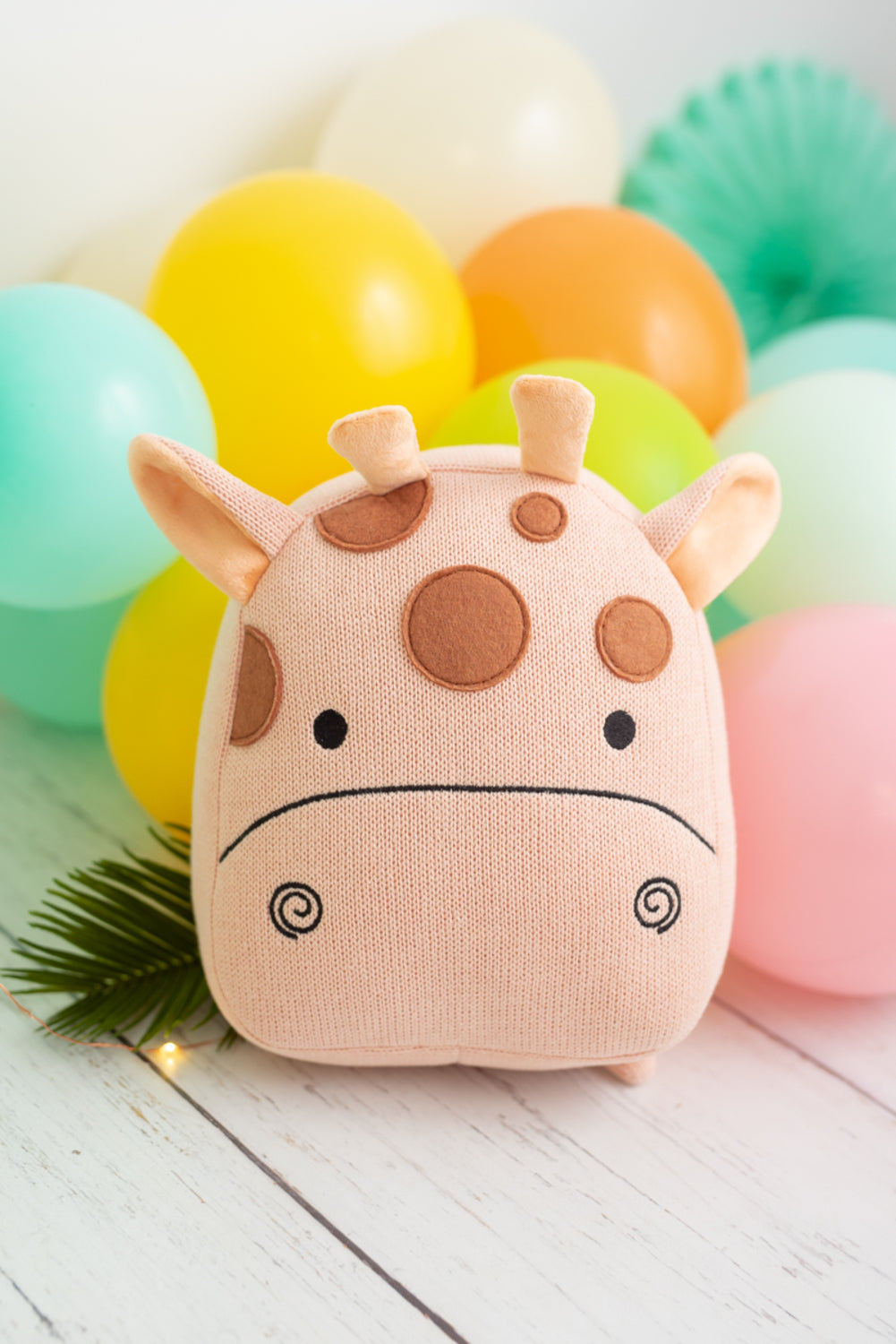 Cojin infantil jirafa rosa