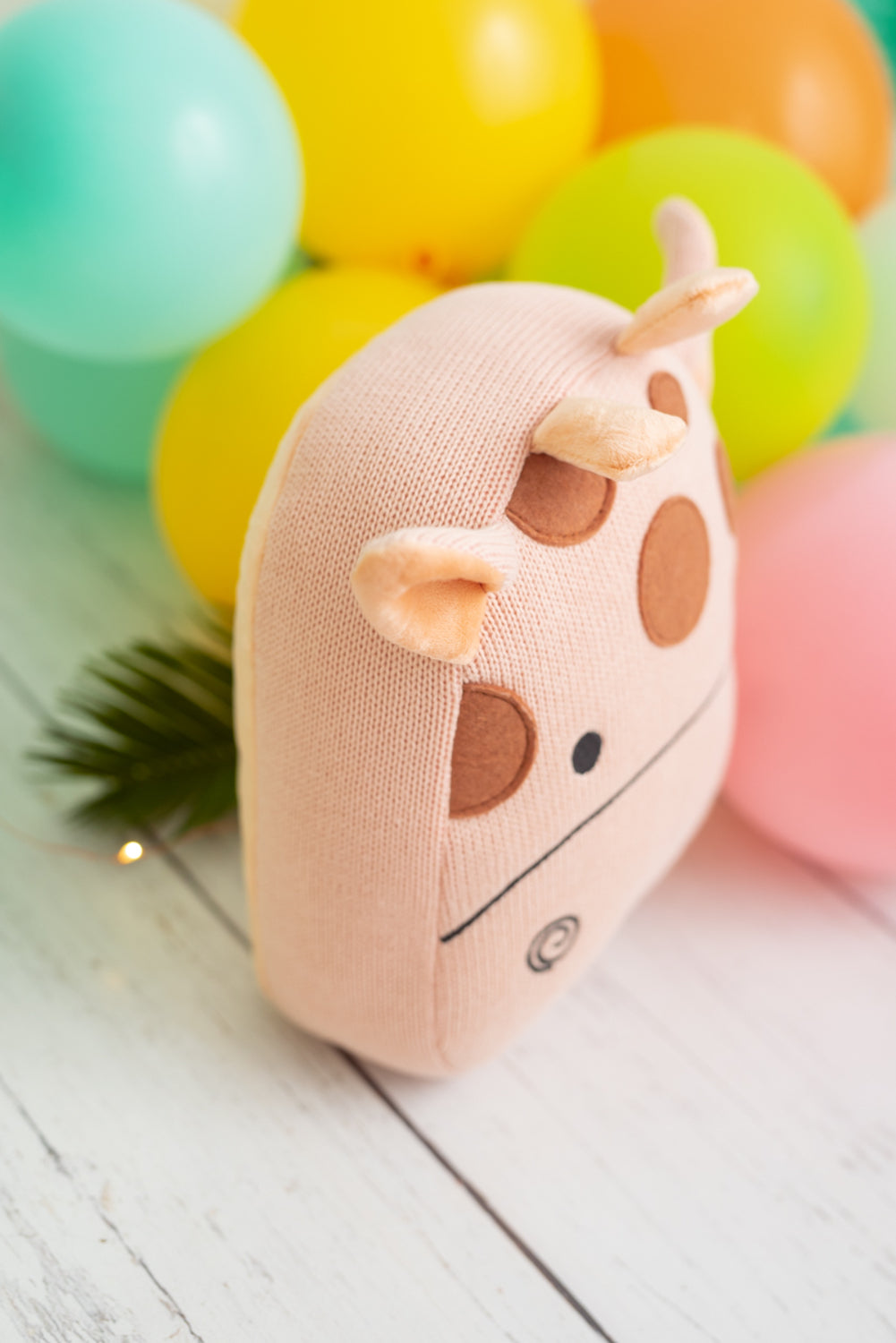 Cojin infantil jirafa rosa