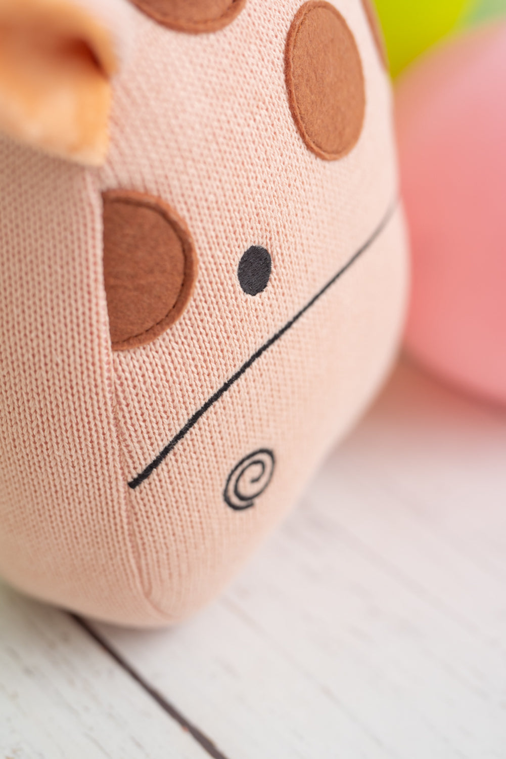 Cojin infantil jirafa rosa