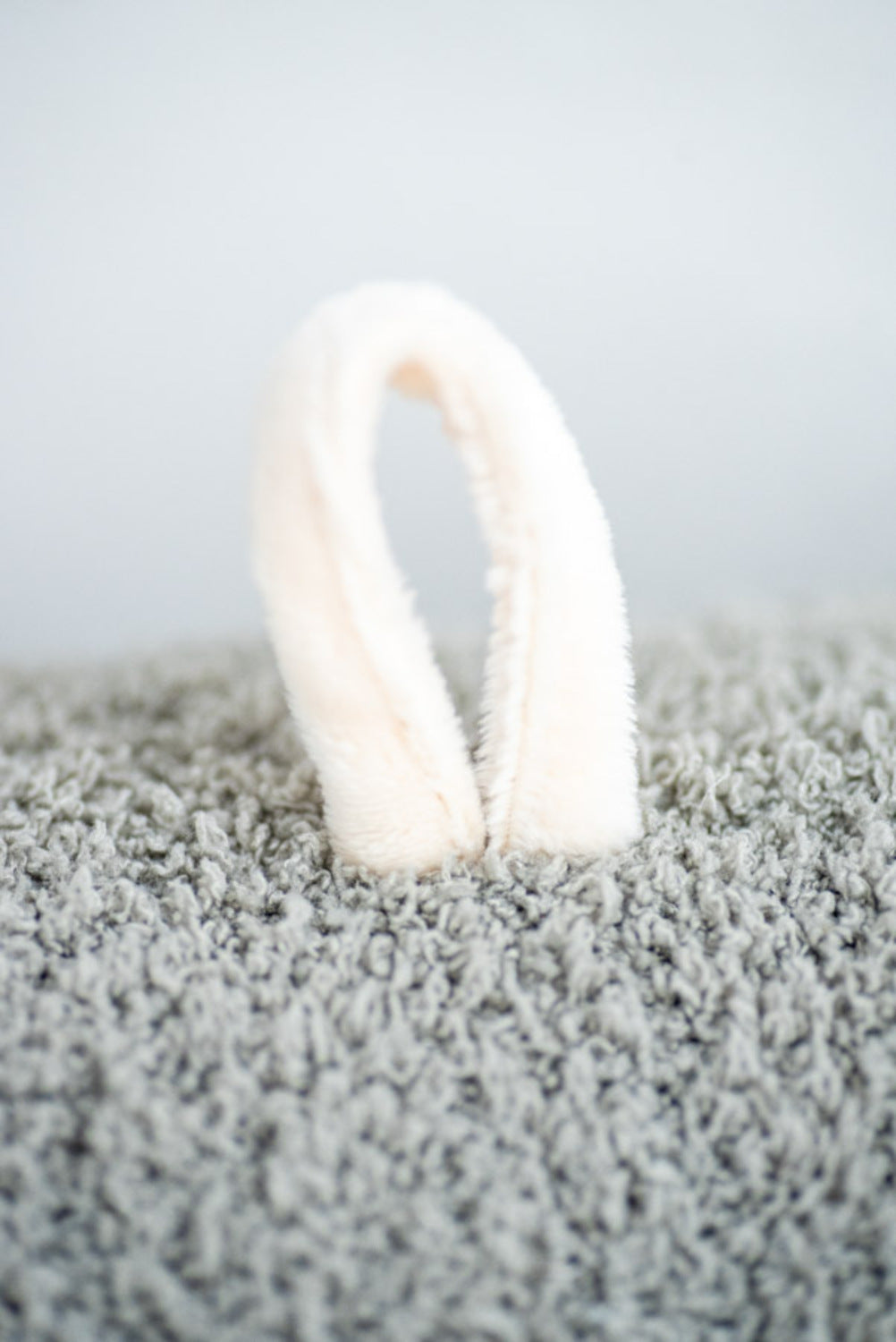 Peluche infantil de pared beluga gris