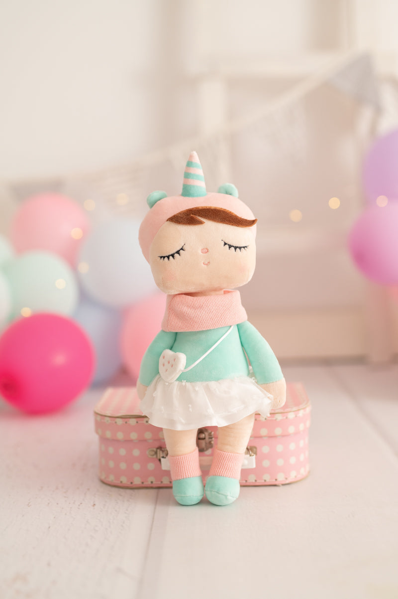 Muñeca infantil tela peluche unicornio rosa y verde