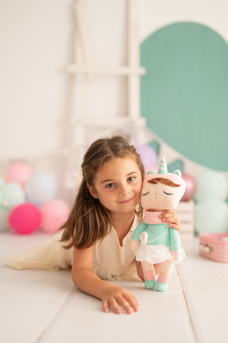 Muñeca infantil tela peluche unicornio rosa y verde